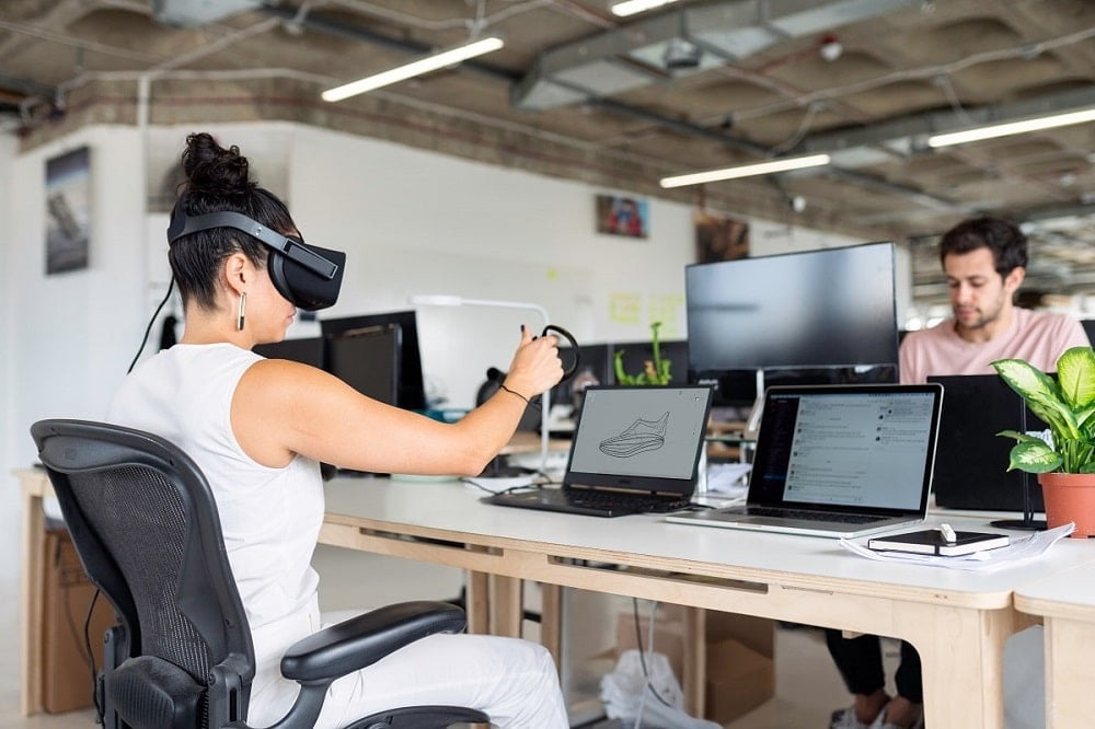 a woman using vr which represents innovation in business